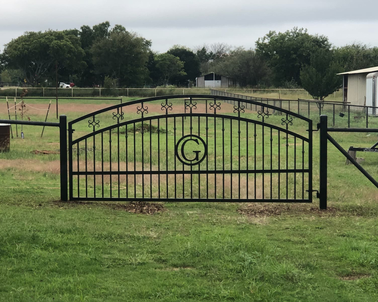 Black metal gate at a farm in dallas TX