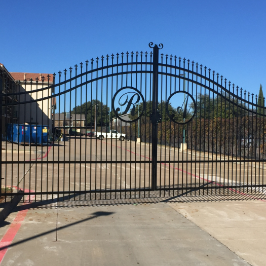 Large black metal electric gate in Dallas, TX