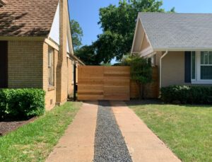New wooden driveway gate in dallas