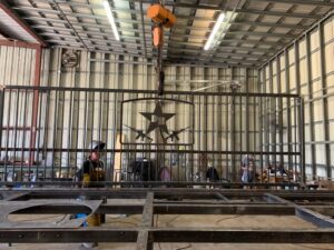 damaged gate being repaired