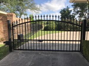 gate ornaments on a gate in Texas