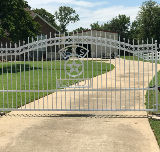Custom white driveway gate in Irving TX